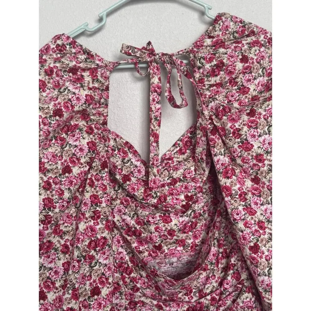 This beautiful Nasty Gal mini dress in size 4 features a vibrant floral print - Picture 5 of 12